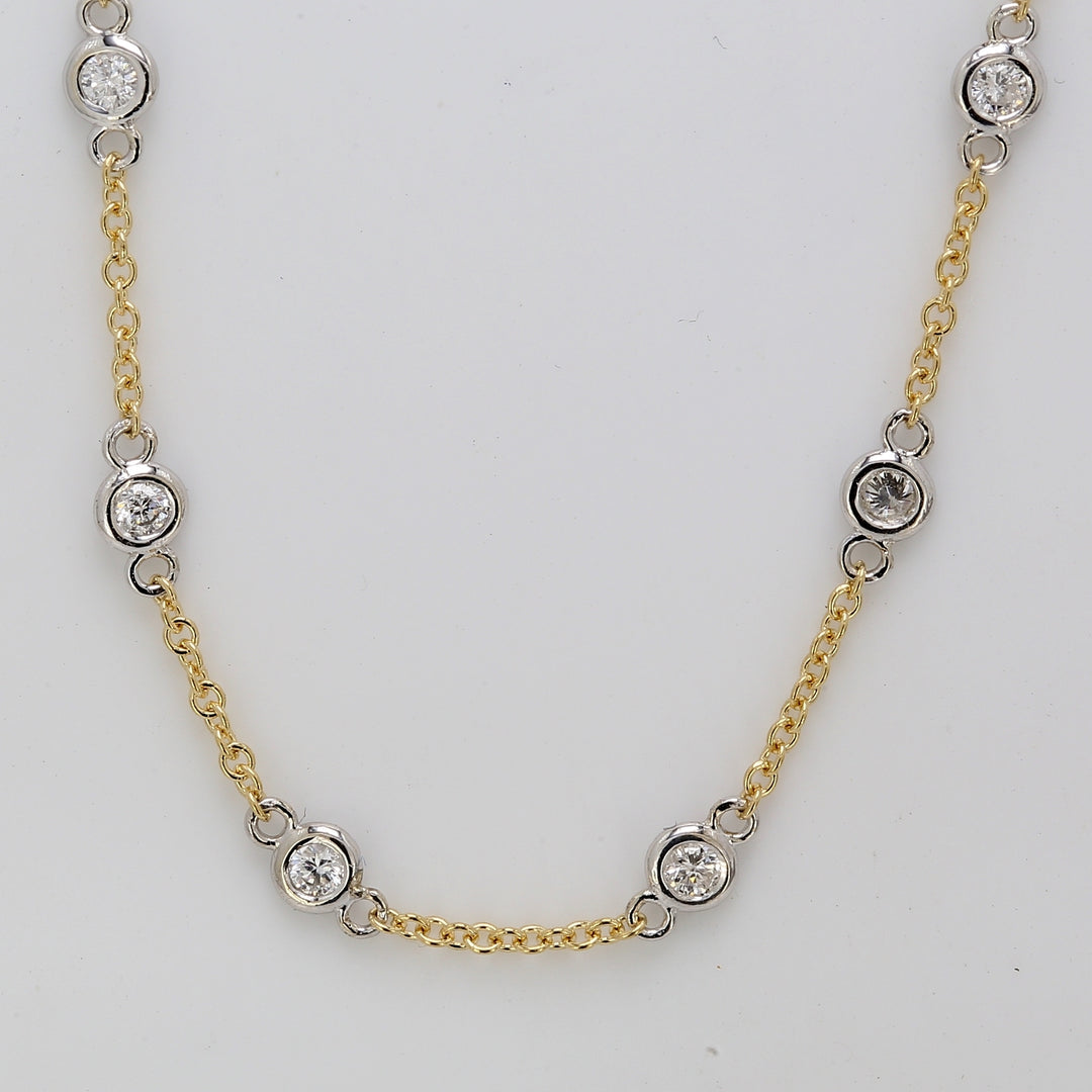 24"" Diamonds by the yard necklace in 18K two-tone with bezel set (40) round diamonds.  D1.22ct.t.w.