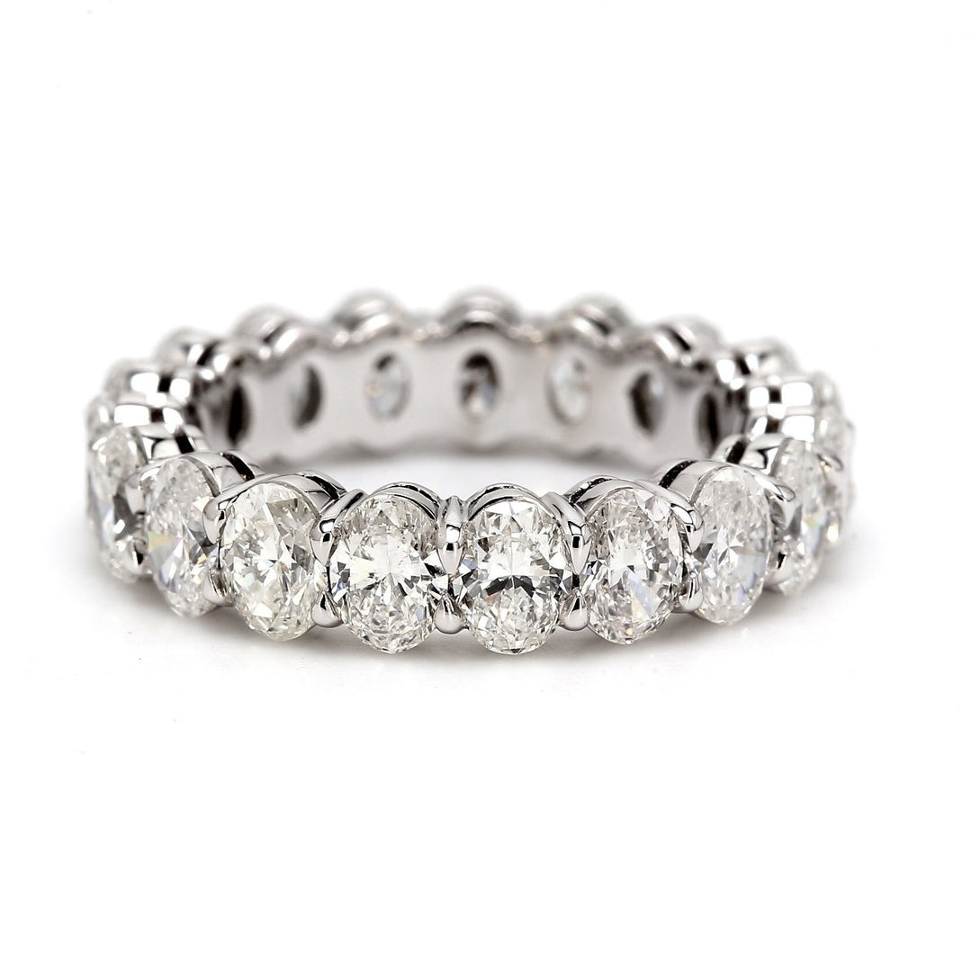 Eternity band in platinum with shared prong set (19) oval cut diamonds.  D4.50ct.t.w.  Size 6.75