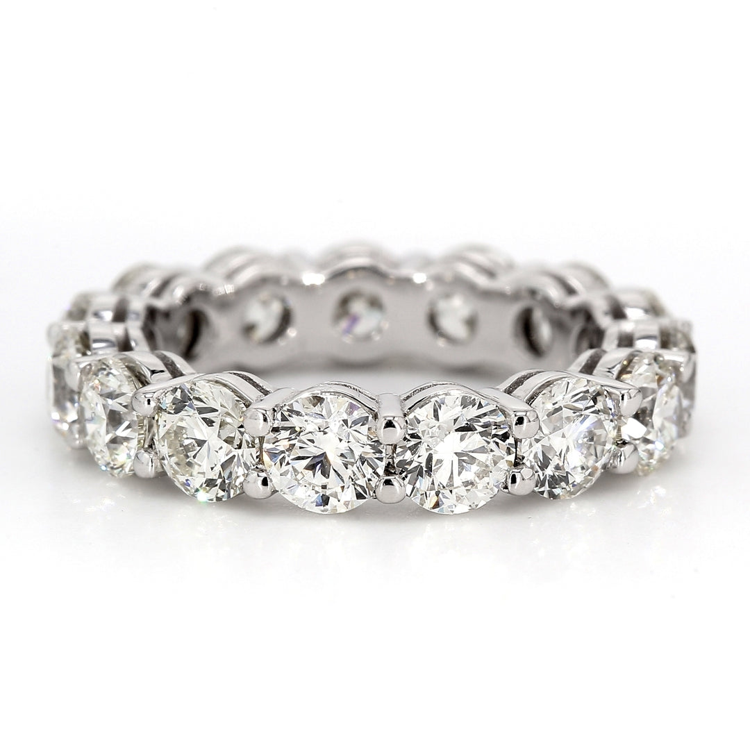Eternity band in platinum with shared prong set (15) round diamonds.  D5.45ct.t.w.  Size 6.25