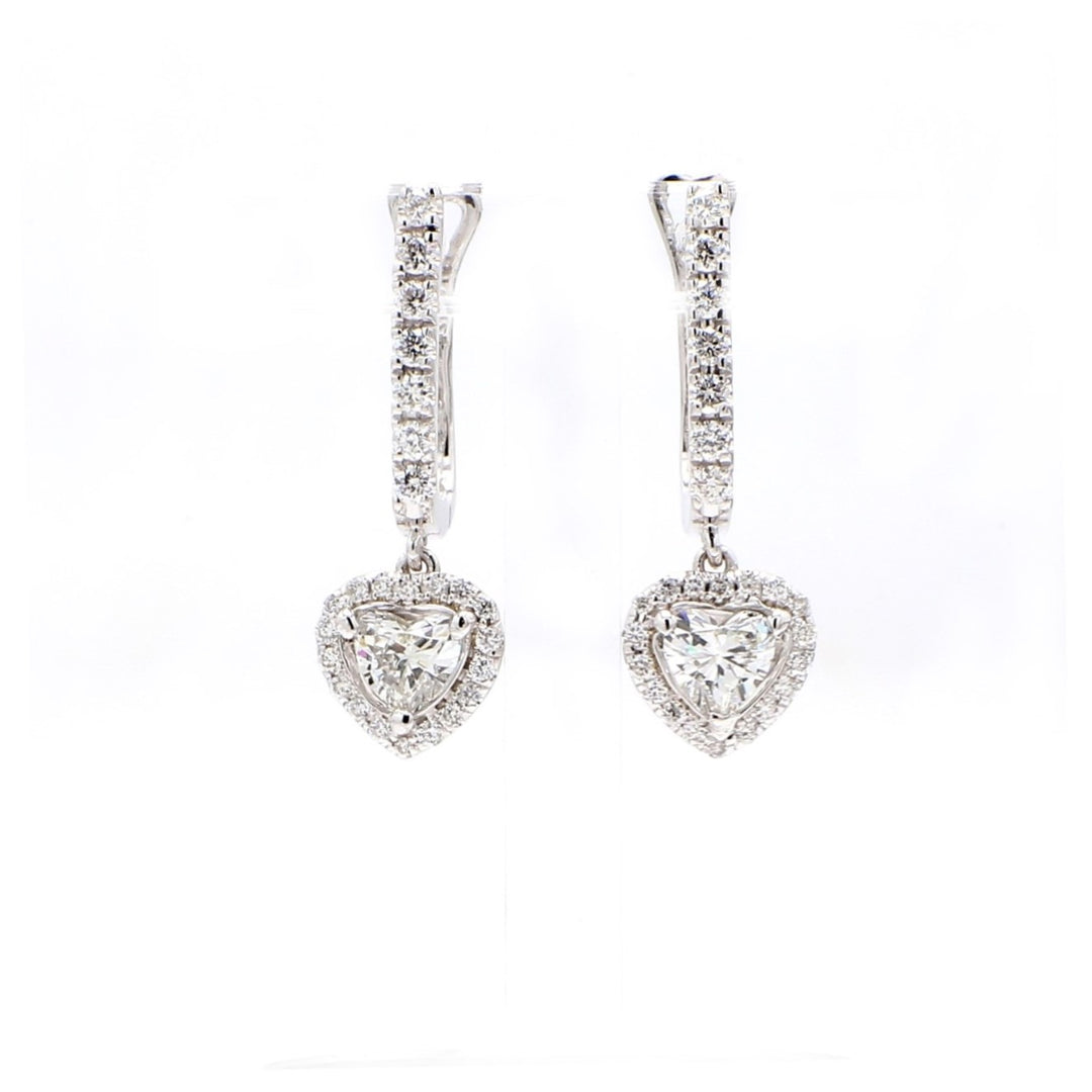 Halo dangling earrings with prong set rounds around 3-prong set heart shape diamond center stones.  D1.22ct.t.w.