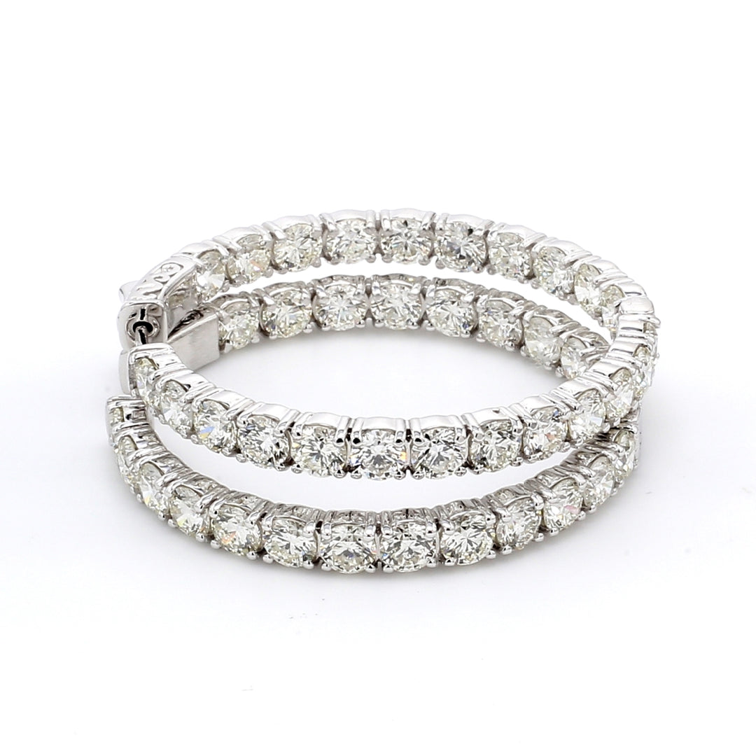 1.5"" Inside out hoop earrings with 4-prong set H/VS round diamonds.  D10.88ct.t.w.