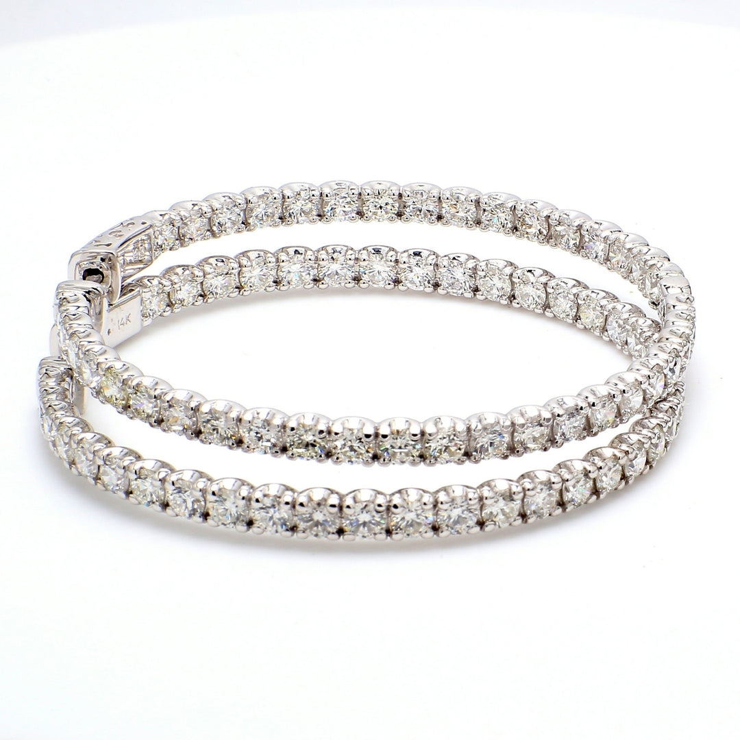 2"" Inside out hoop earrings with U-prong set (78) round diamonds & with special spring lock. D7.63ct.t.w.