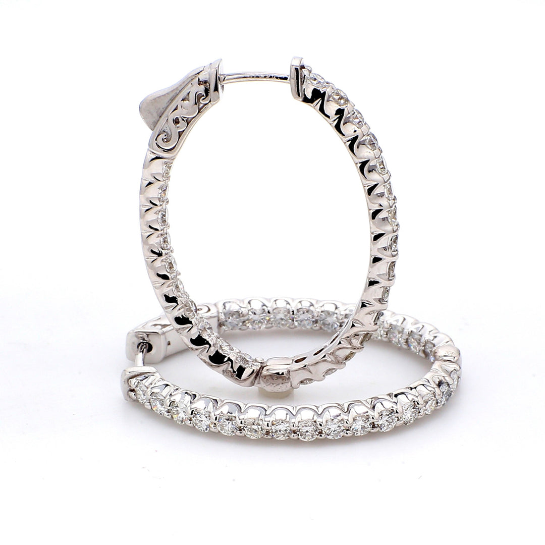 2"" Oval shaped inside out hoop earrings with U-prong set round diamonds & with special spring lock.  D3.45ct.t.w.