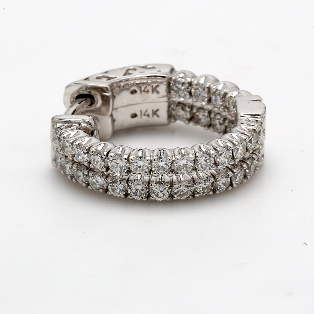 0.5"" Inside out hoop earrings with prong set (34) round diamonds & with special spring lock.  D0.85ct.t.w.