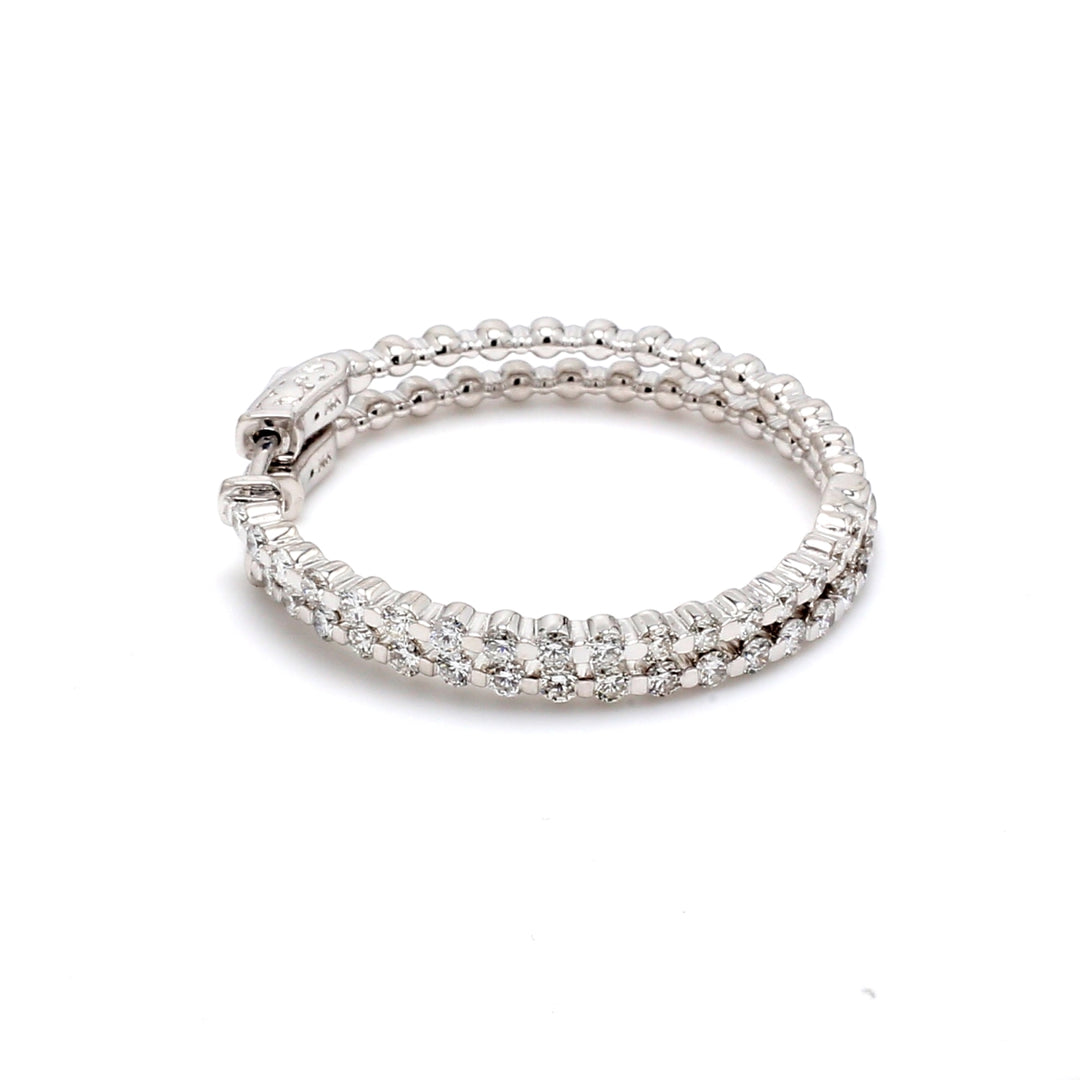 0.75"" Inside out hoop earrings with 4-prong set (50) round diamonds & with special spring lock.  D0.53ct.t.w.
