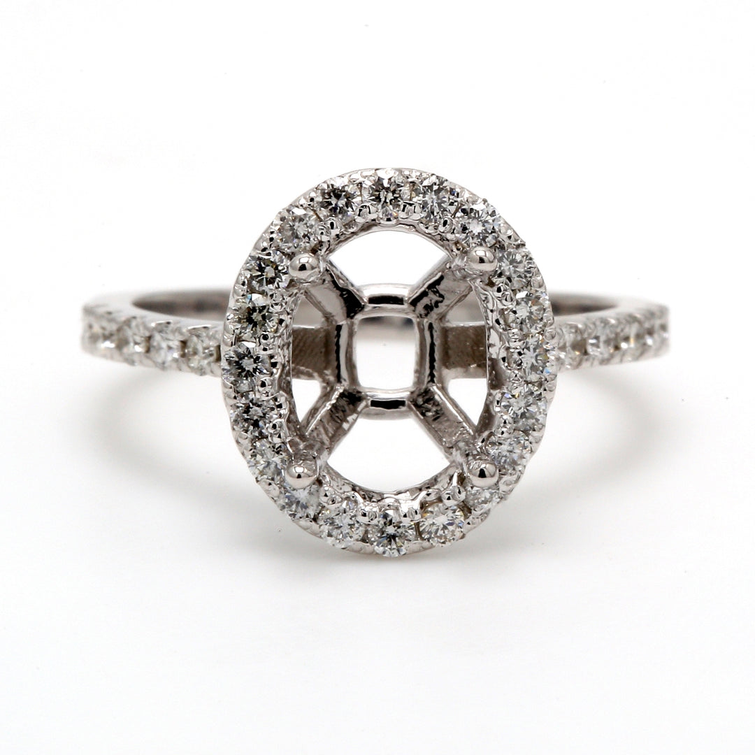 Halo semi-mount with U-prong set round diamonds.  D0.46ct.t.w.