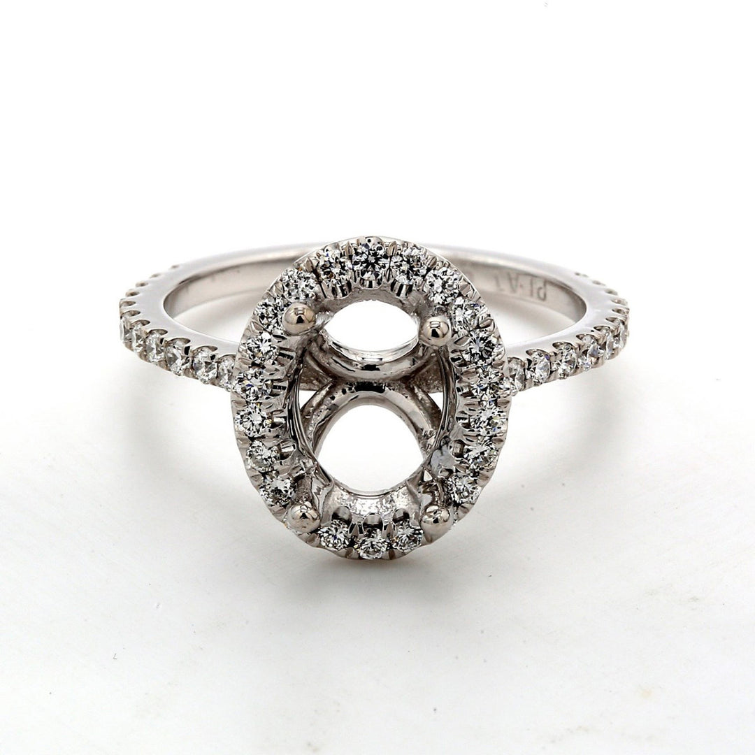 Halo semi-mount with U-prong set round diamonds.  D0.49ct.t.w.  Size 6