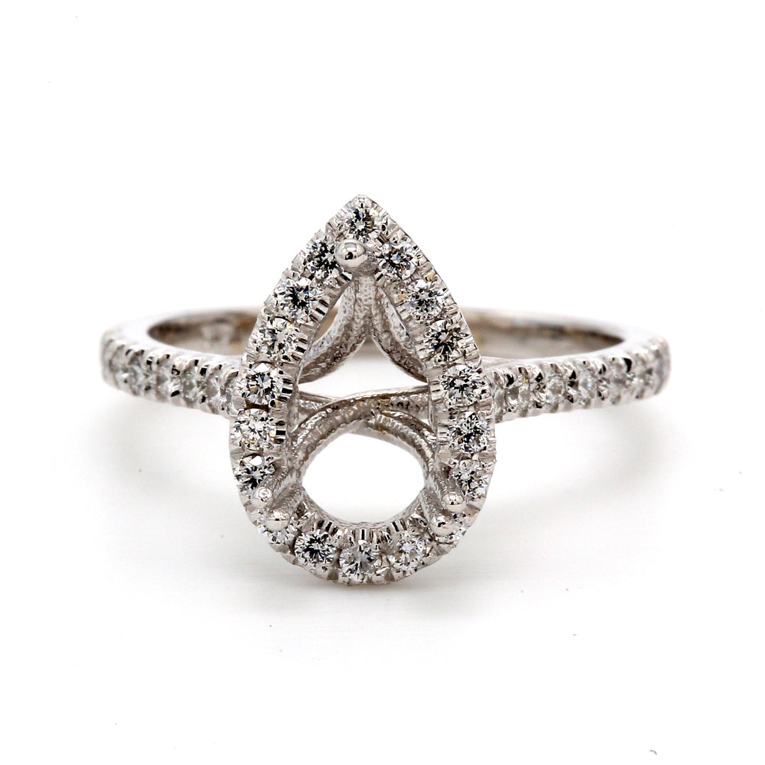 Halo semi-mount with U-prong set round diamonds.  D0.41ct.t.w.  Size 6.5