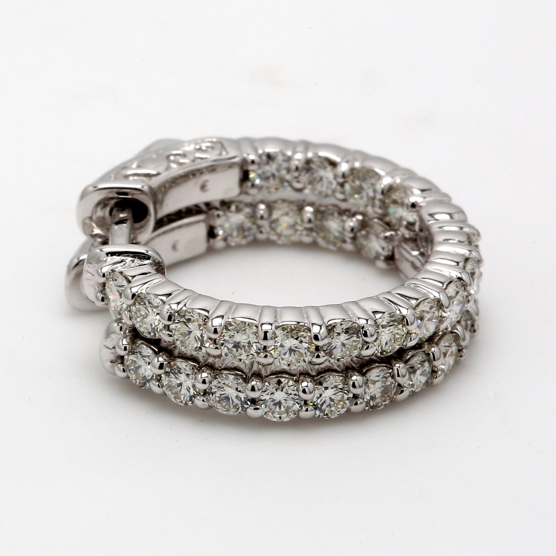 0.5"" Inside out hoop earrings with prong set (30) round diamonds & with special spring lock.  D1.39ct.t.w.