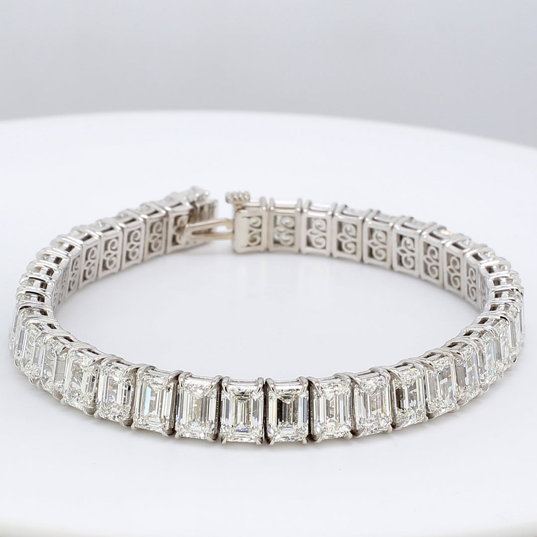 7"" Tennis bracelet in platinum with 4-prong basket set GIA certified G-I/IF-VS2 (40) emerald cut diamonds.  D28.86ct.t.w.