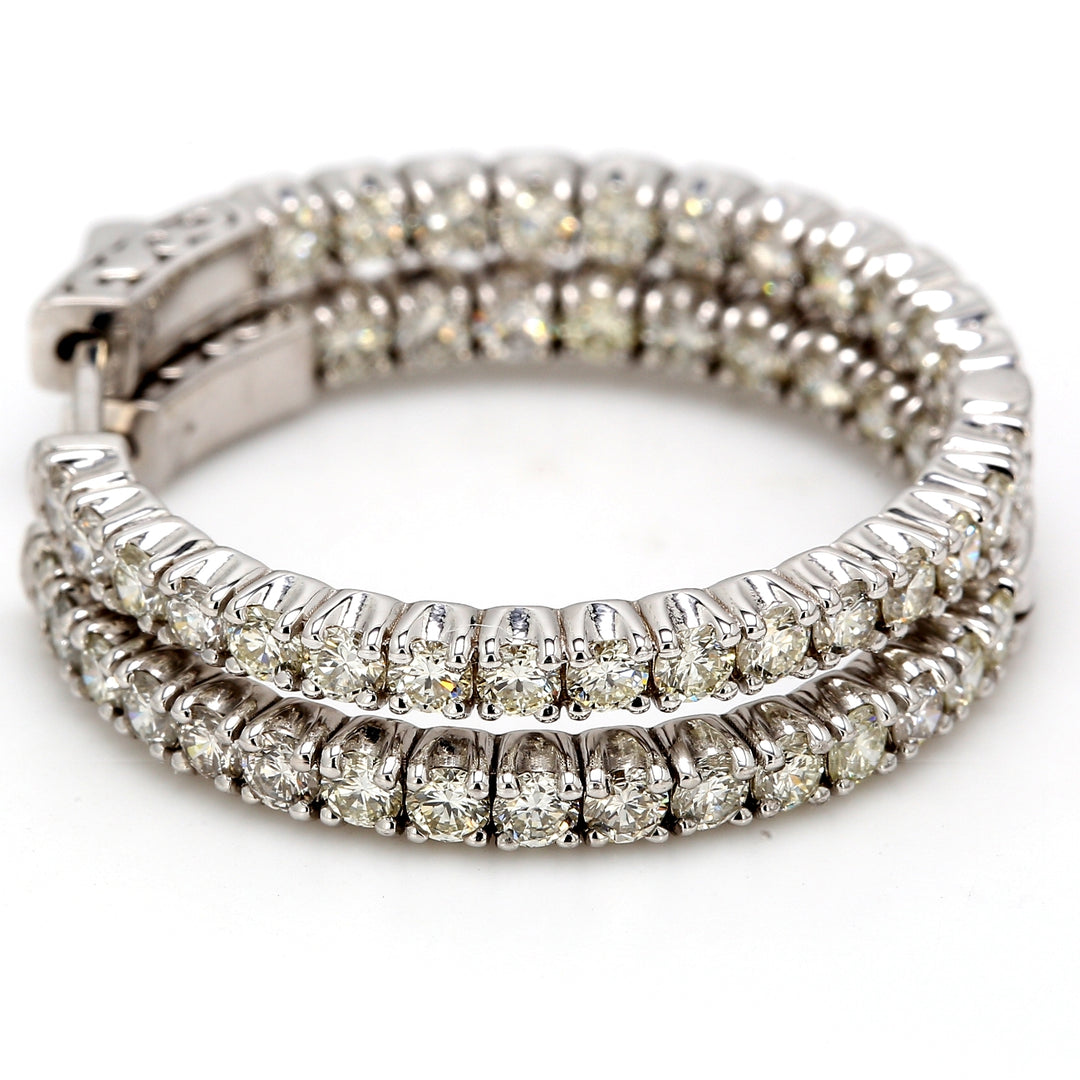 1.5"" Inside out hoope earrings with 4-prong set (52) round diamonds & with special spring lock.  D2.30ct.t.w.