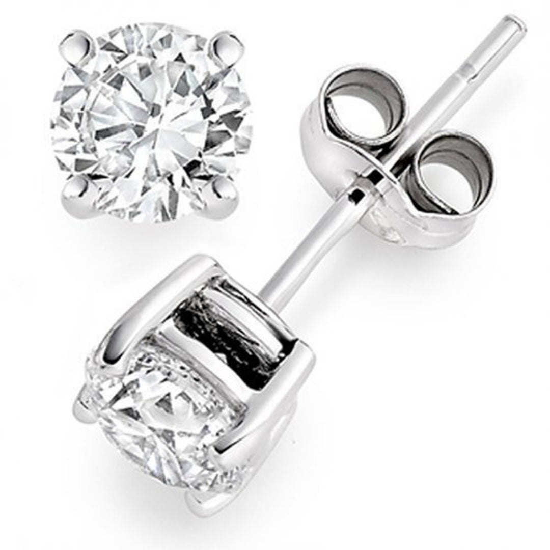 Push back stud earrings with prong set USA certified G/VS2-SI1 round diamonds.  D3.57ct.t.w