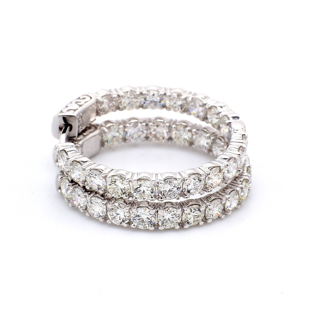 1"" Inside out hoop earrings with 4-prong set (36) round diamonds & with special spring lock.  D5.41ct.t.w.