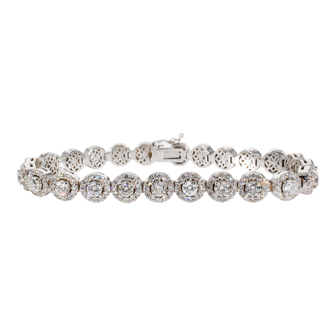 7"" Halo tennis bracelet with clustered round centers & 4-prong set round diamonds.  D7.52ct.t.w.