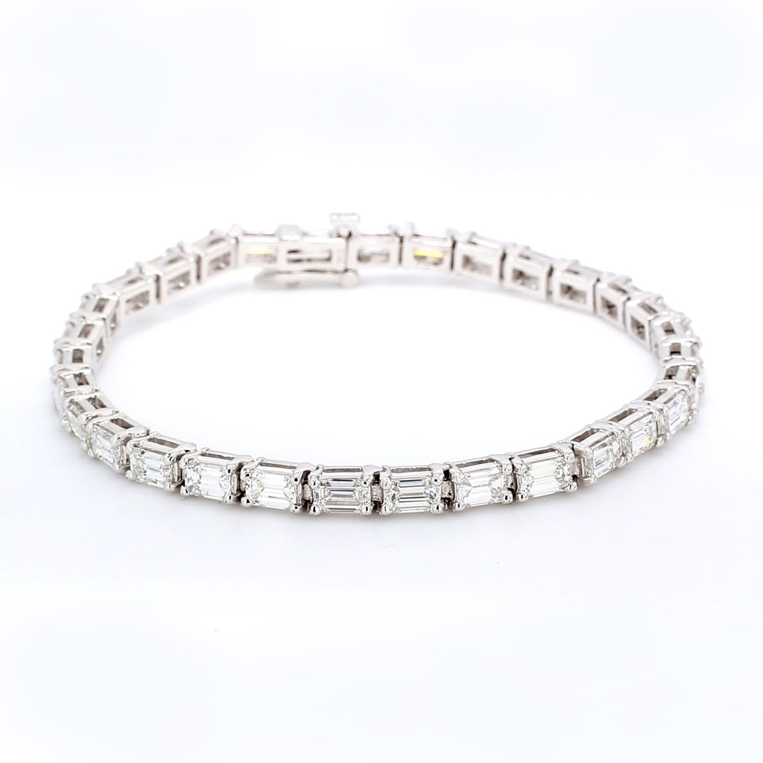 7"" East to west style tennis bracelet with 4-prong set (31) emerald cut diamonds.  D8.24ct.t.w.