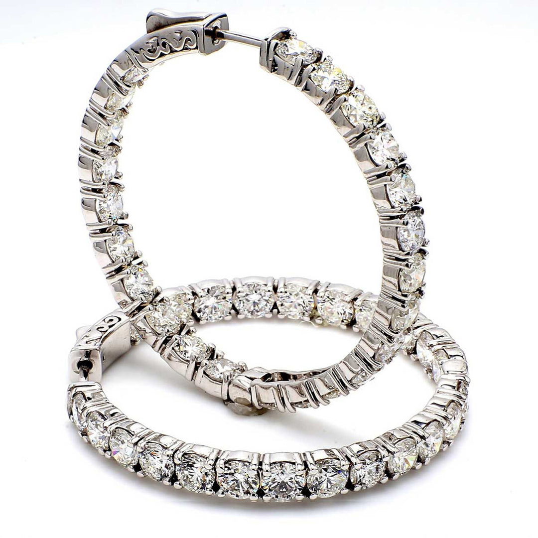 0.75"" Inside out hoop earrings with 4-prong set (20) round diamonds & with special spring lock.  D3.80ct.t.w.