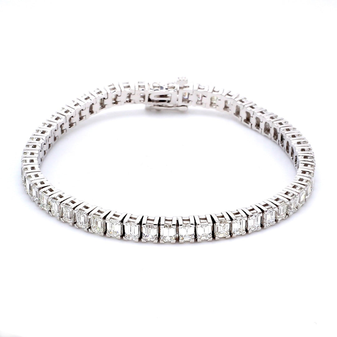 7""  Tennis bracelet with 4prong set F-G/VS (54) emerald cut diamonds.  D10.27ct.t.w.