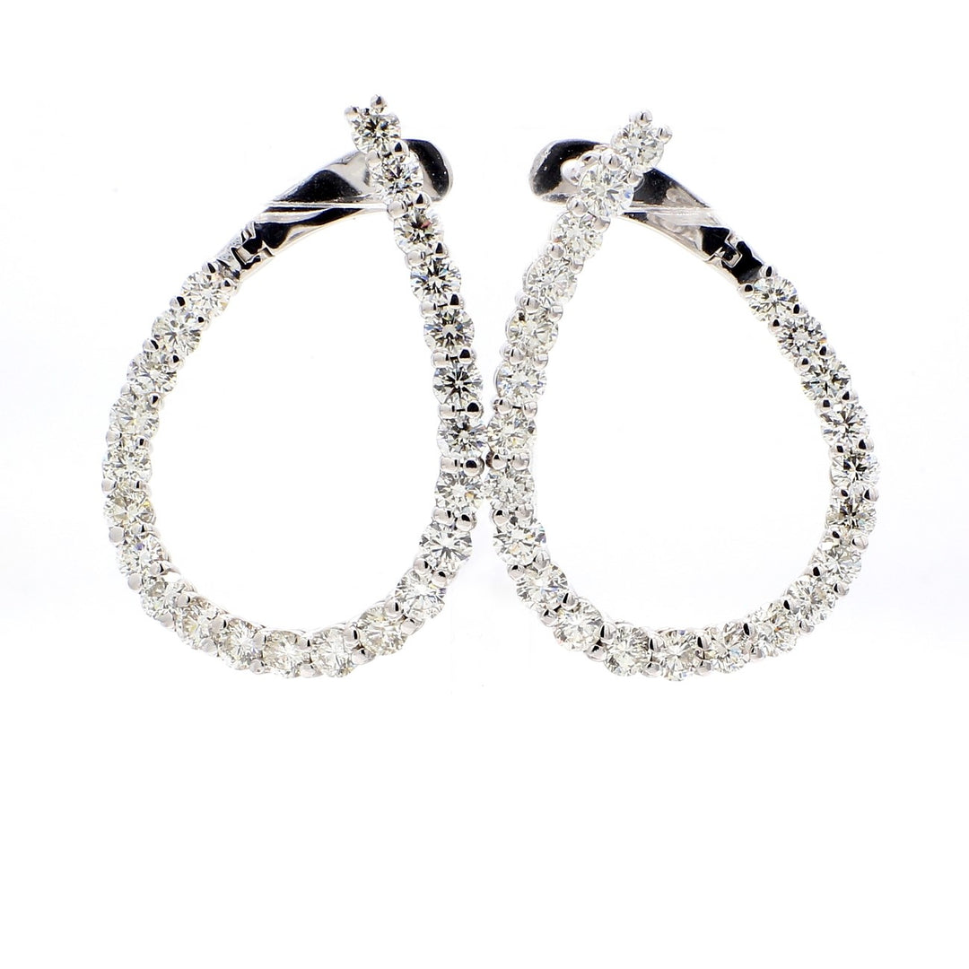 J-shaped huggy earrings with shared prong set (46) round diamonds.  D4.59ct.t.w.