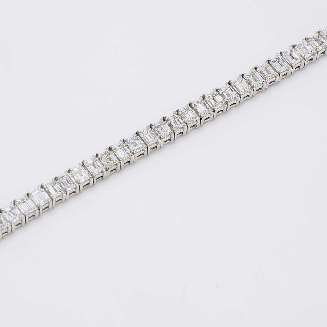 7"" Tennis bracelet with 4-prong set (57) emerald cut diamonds.  D8.88ct.t.w.