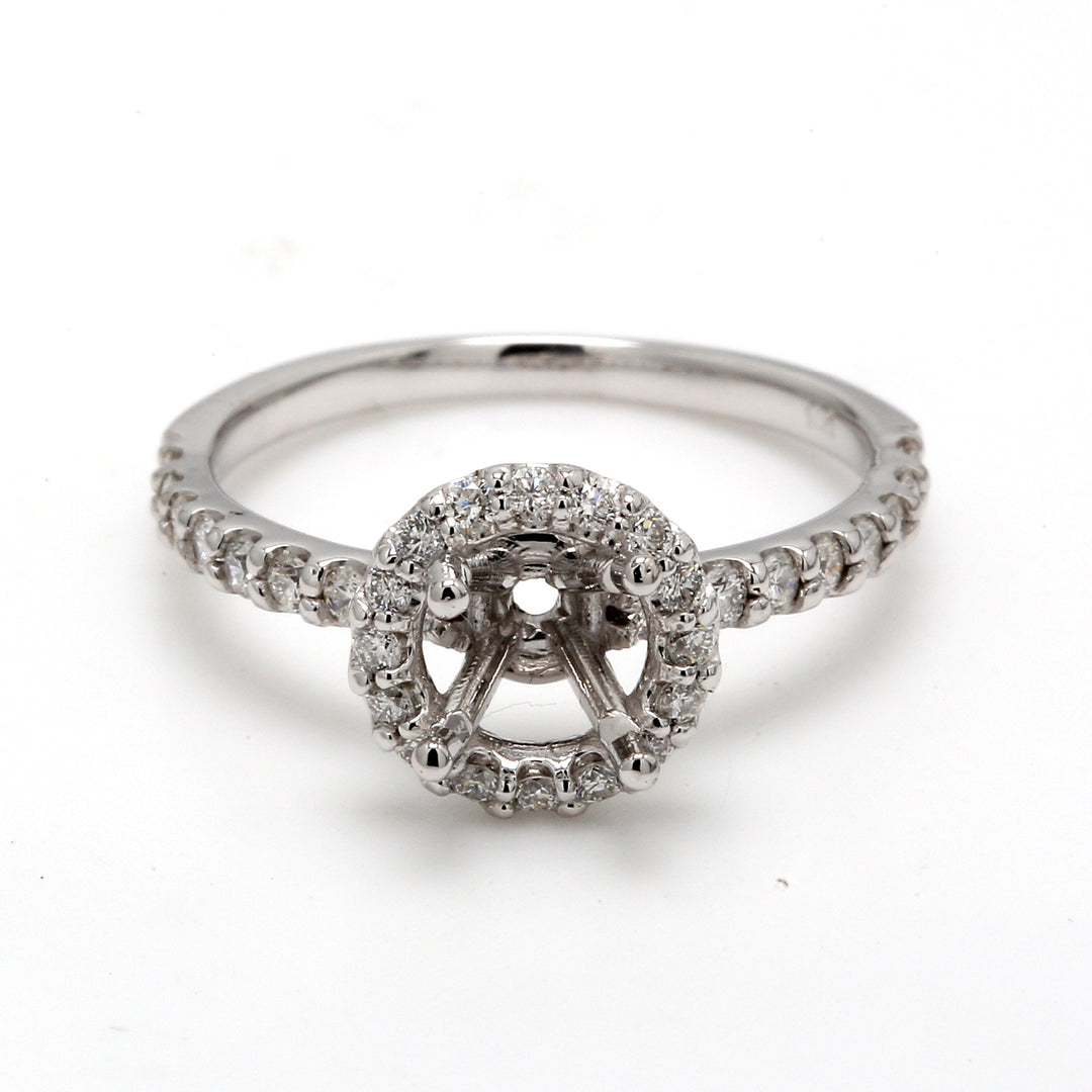 Halo semi-mount with U-prong set round diamonds.  D0.48ct.t.w.