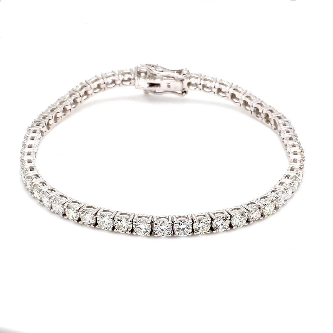 7"" Tennis bracelet with 4-prong set (51) round diamonds.  D7.36ct.t.w.