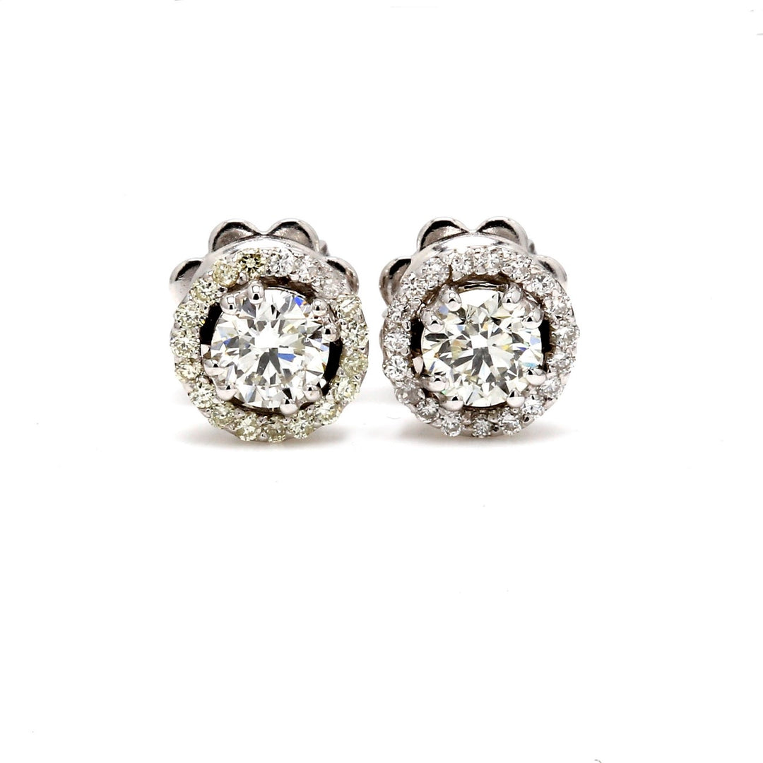 Halo push back stud earrings with prong set round diamonds.  D0.83ct.t.w.