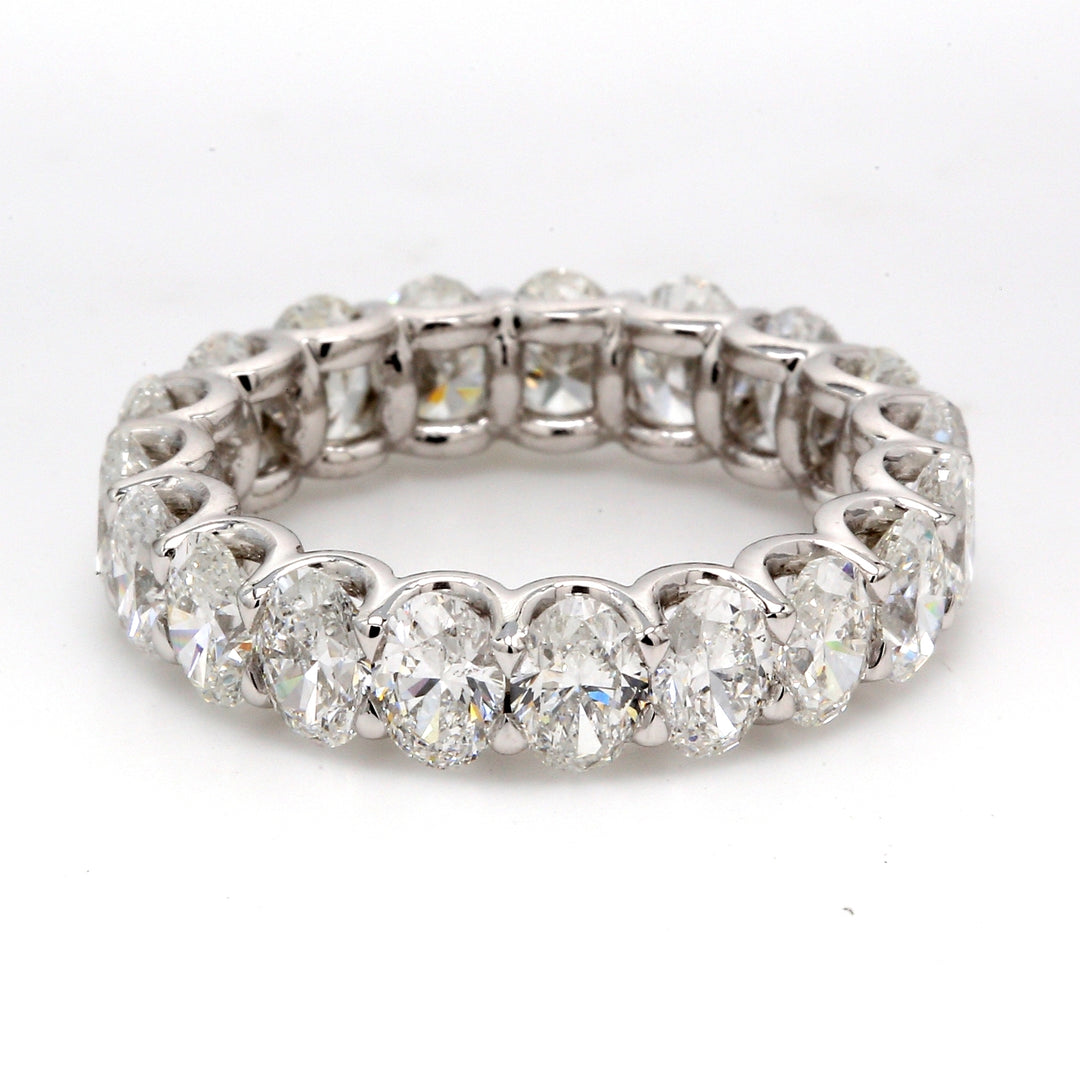 Eternity band in platinum with shared U-prong set oval diamonds.  D4.55ct.t.w.