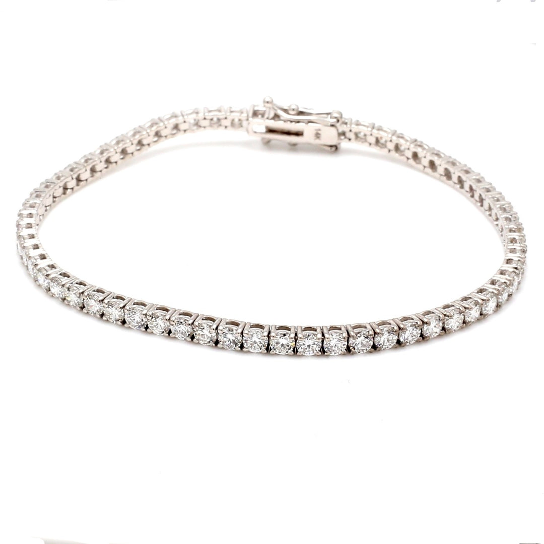 7.25"" Tennis bracelet with 4-prong set (62) round diamonds.  D4.91ct.t.w.