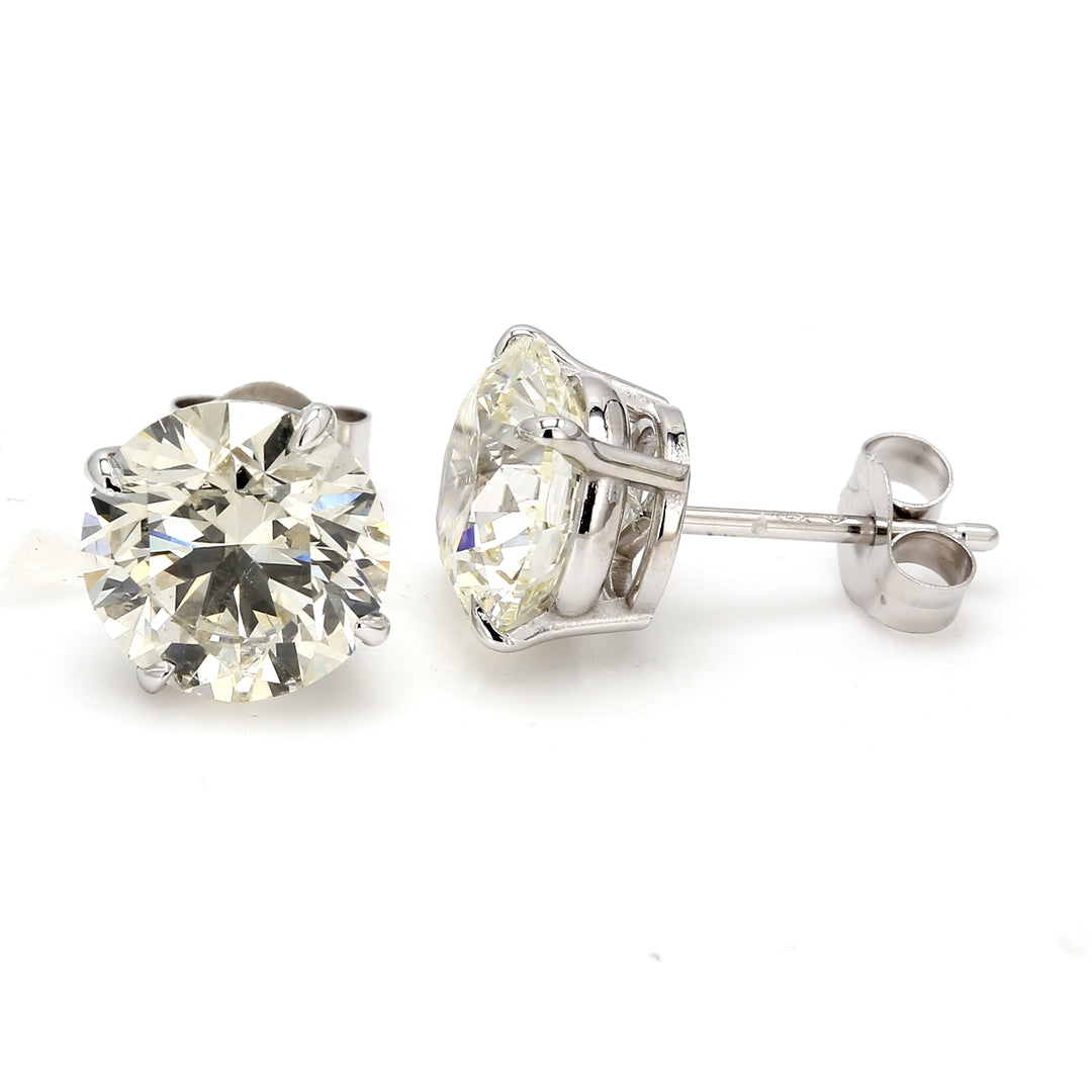 Push back stud earrings with 4-prong set round diamonds.  D4.05ct.t.w.