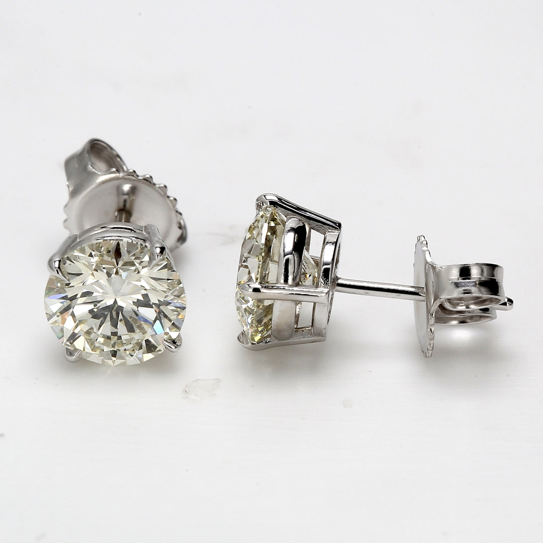 Push back stud earringswith 4-prong set USA certified H-I/SI1-SI2 round diamonds.  D3.03ct.t.w.