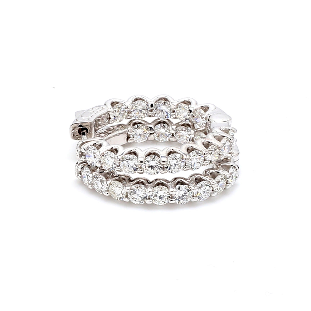 1"" Inside out hoop earrings with shared U-prong set round diamonds.  D3.45ct.t.w.