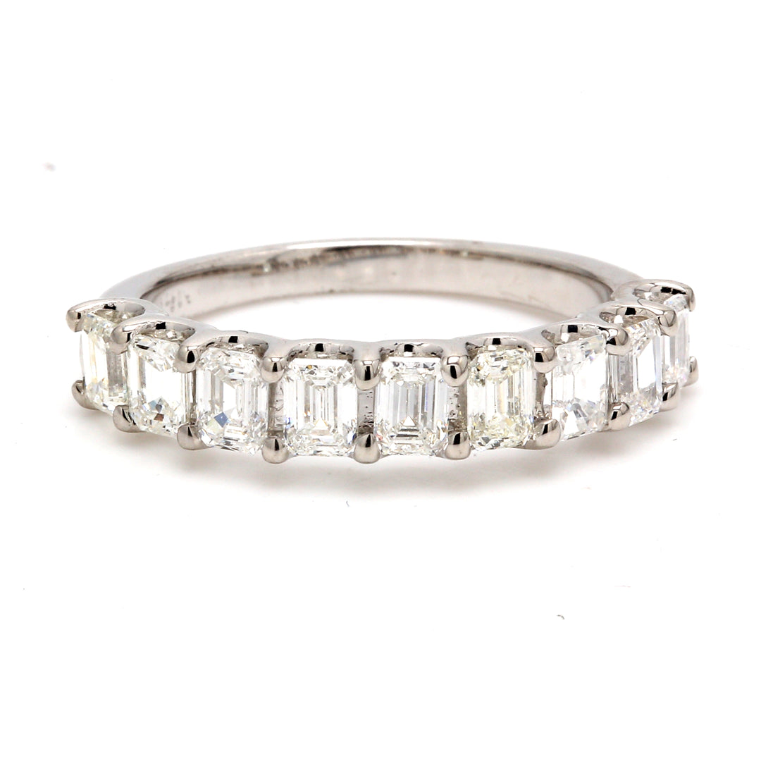 9-stone band with shared U-prong set emerald cut diamonds.  D1.44ct.t.w.