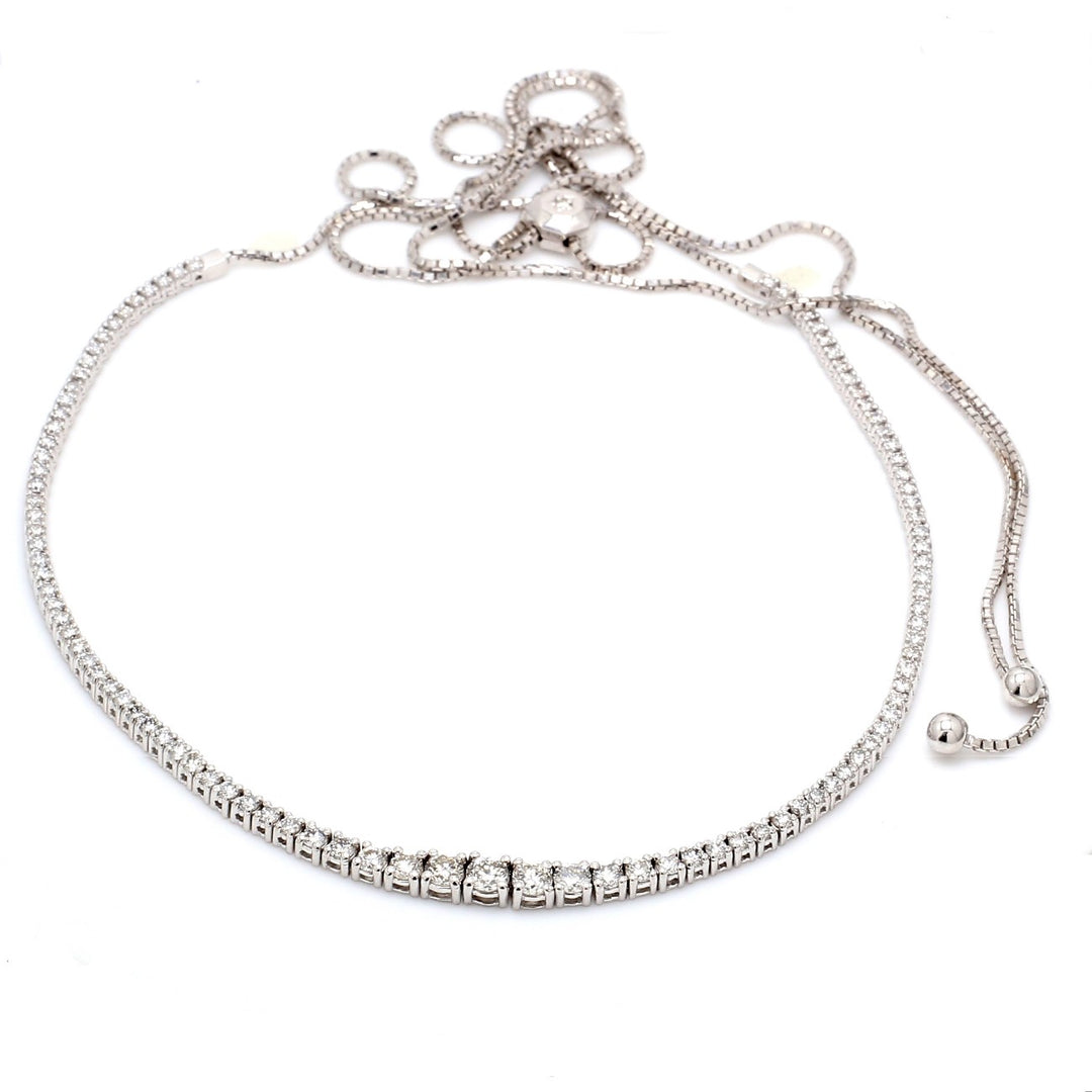Graduated expandable necklace with 4-prong & bezel set round diamonds.  D3.40ct.t.w.