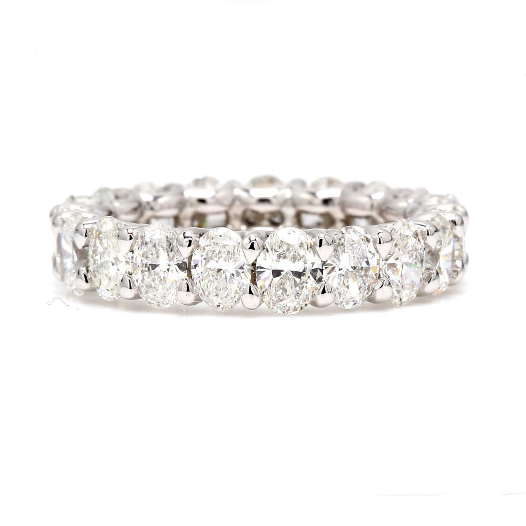 Eternity band in platinum with shared U-prong set (19) oval diamonds.  D3.76ct.t.w.  Size 5.5