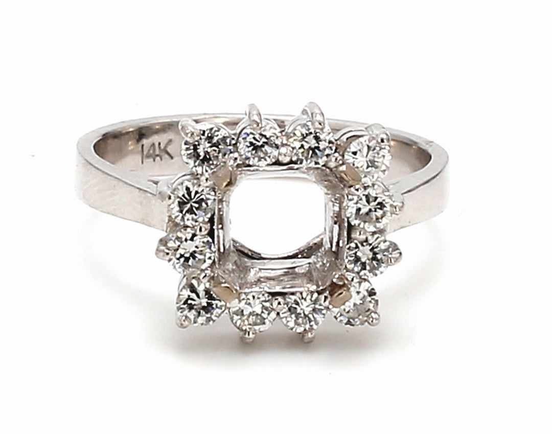 Halo semi-mount with prong set round diamonds.  D0.60ct.t.w.