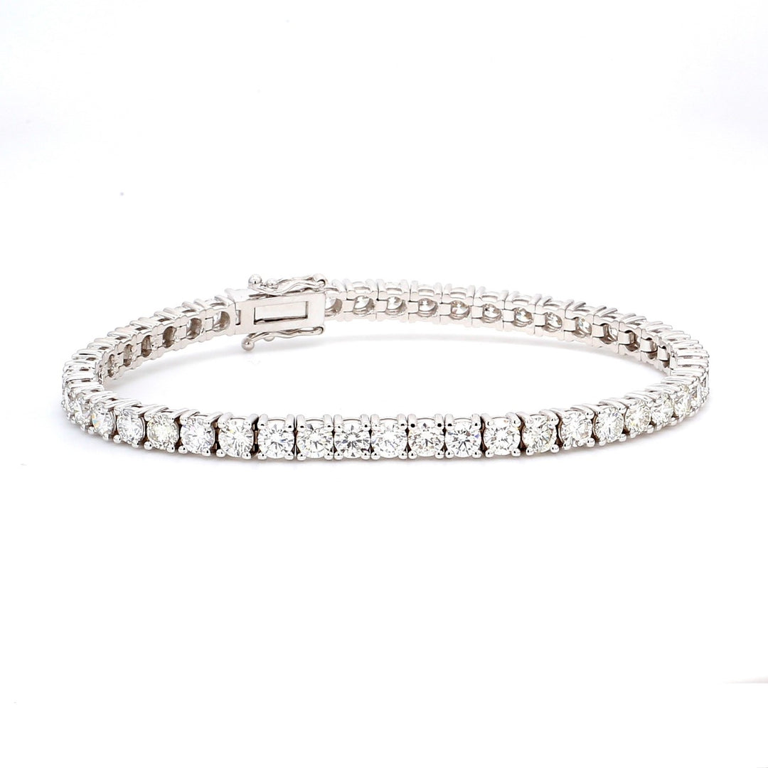 7"" Tennis bracelet in 18K WG with 4-prong set (47) round diamonds.  D8.07ct.t.w.
