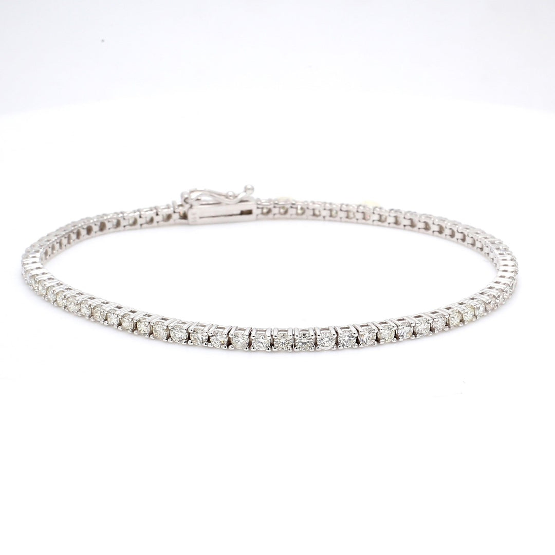7"" Tennis bracelet with 4-prong set (93) round diamonds.  D1.43ct.t.w.