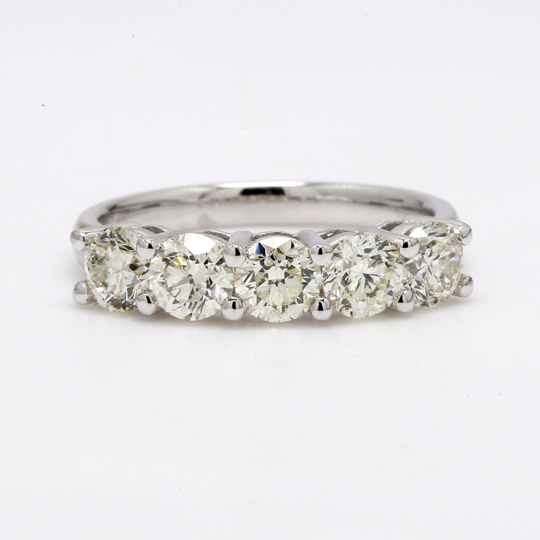 5 stone band with shared prong set round diamonds.  D1.87ct.t.w.  Size 6.75