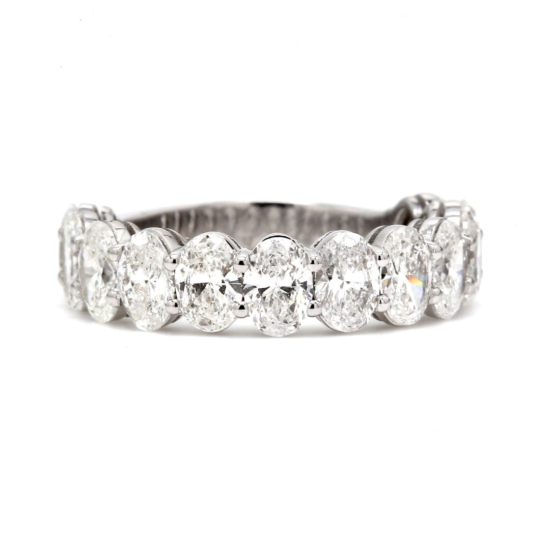 Euro shank band with double basket shared prong set (12) oval diamonds.  D2.55ct.t.w.  Size 4.75