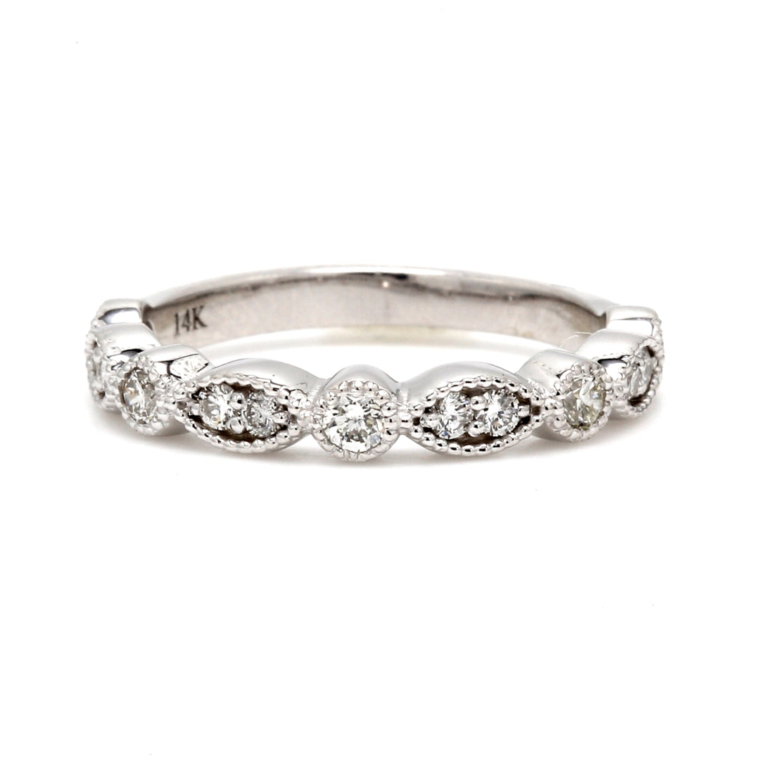 13-stone band with prong set round diamonds.  D0.33ct.t.w.  Size 4.5