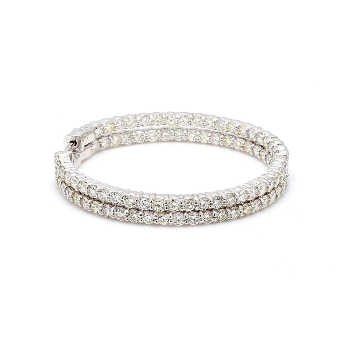 1.75"" Inside out hoop earrings with prong set (86) round diamonds & with special spring lock.  D5.41ct.t.w.