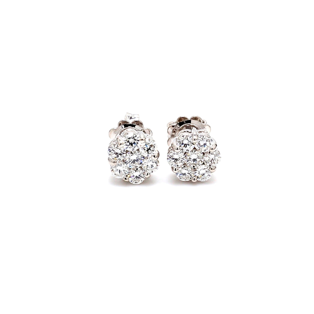 Screw back cluster earrings with prong set (14) round diamonds.  D1.19ct.t.w.