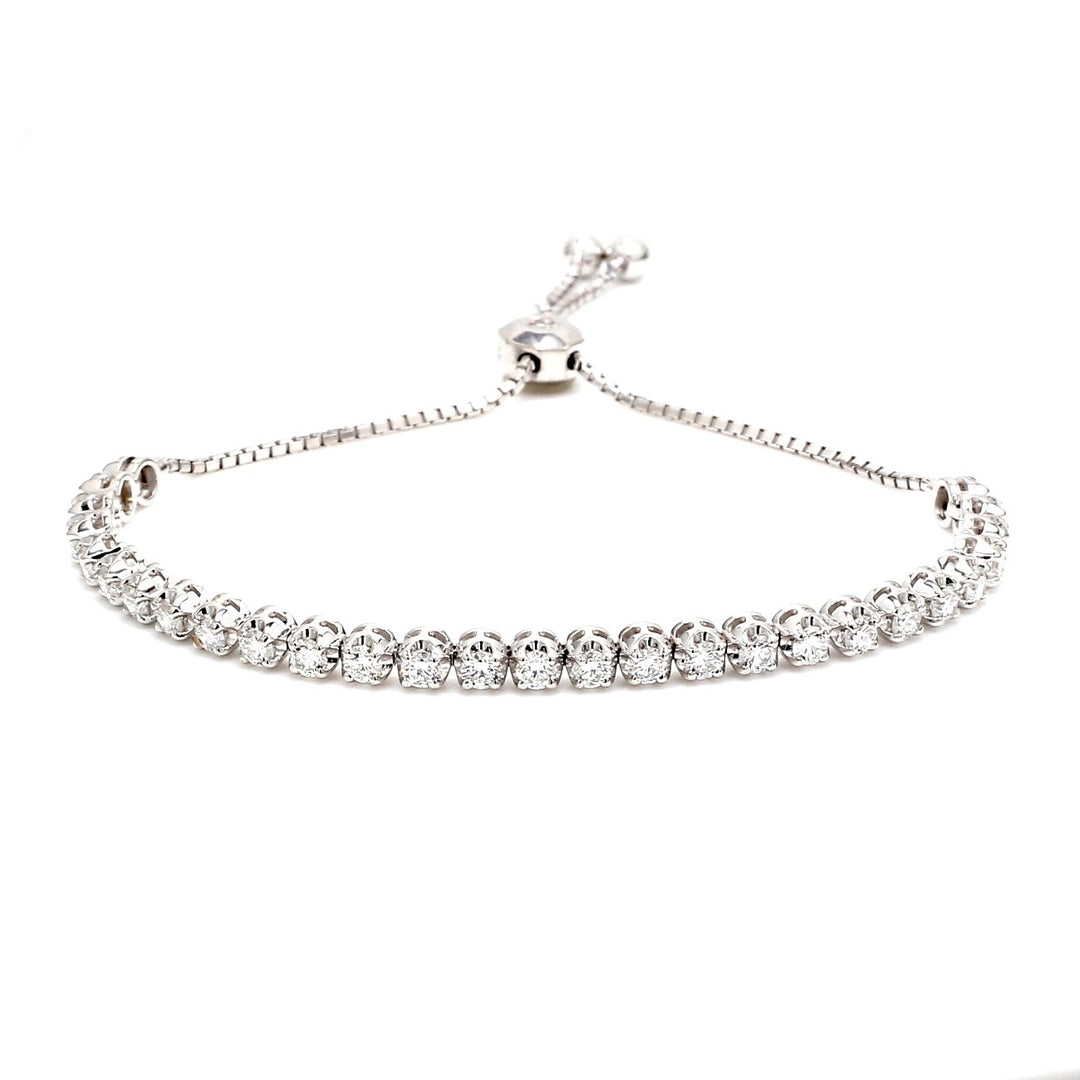Bolo style adjustable tennis bracelet with 4-prong set (30) round diamonds.  D2.32ct.t.w.
