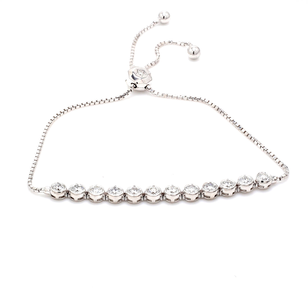 Bolo style adjustable tennis bracelet with bezel & prong set (14) round diamonds.  D1.53ct.t.w.