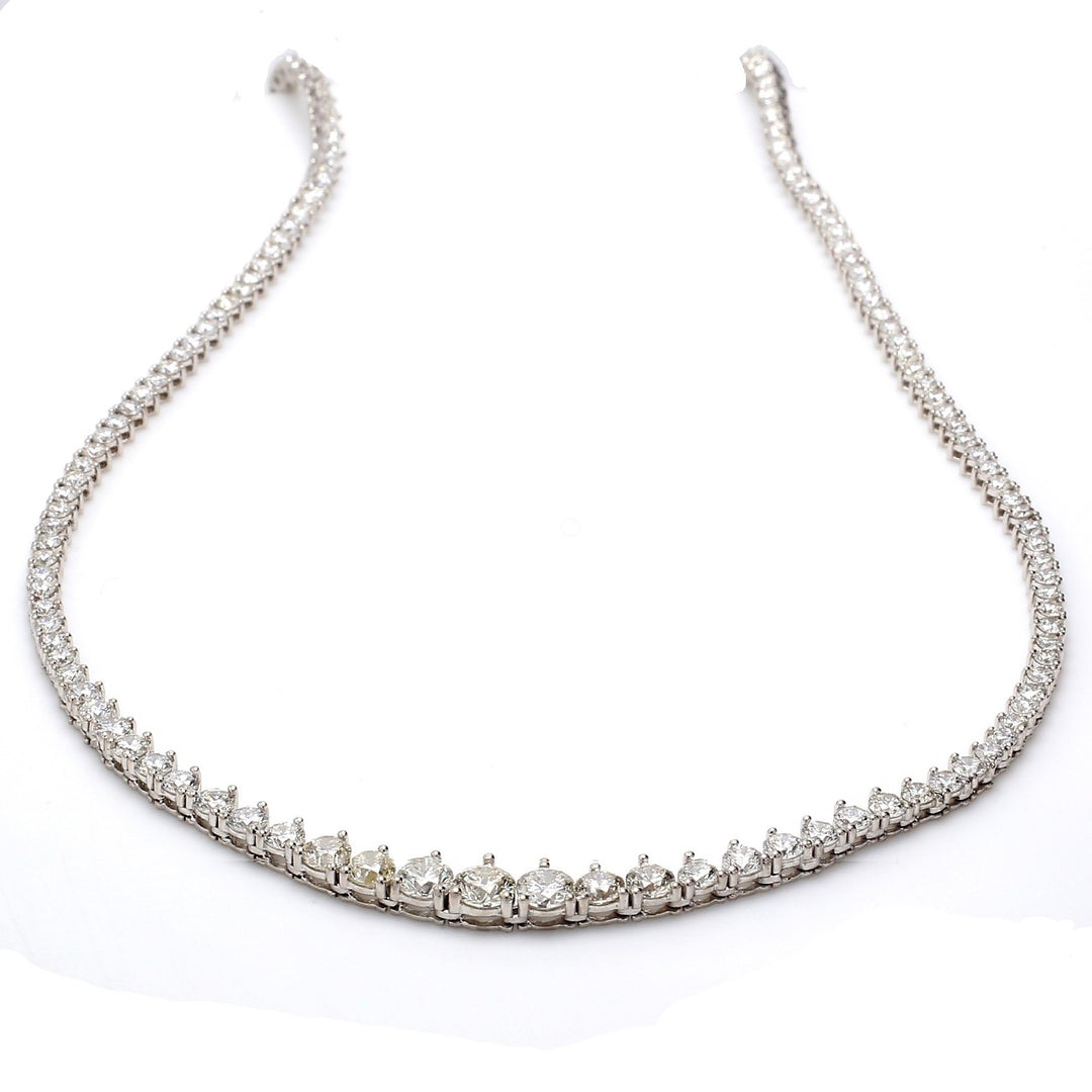 17.5"" Graduated tennis necklace in 18K WG with 3-prong set (192) round diamonds.  D9.33ct.t.w.