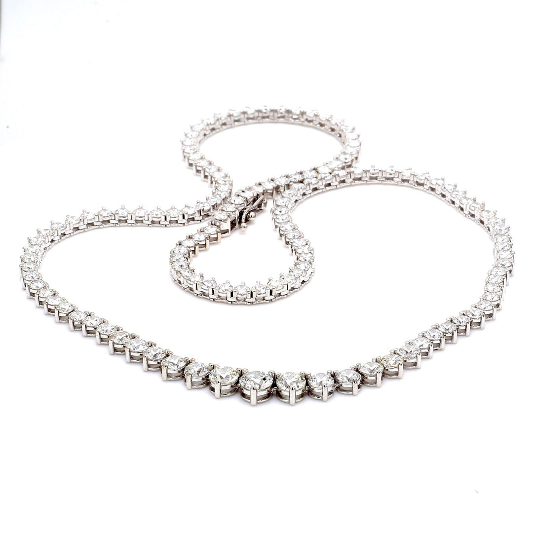 17"" Graduated tennis necklace in 18K WG with 3-prong set (130) round diamonds.  D12.40ct.t.w.