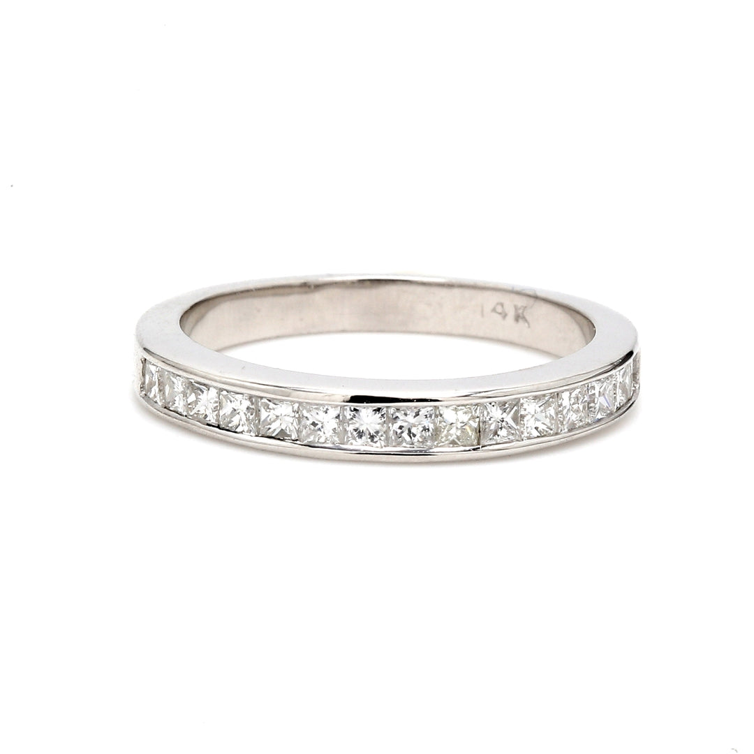 Band with channel set (15) princess cut diamonds.  D0.55ct.t.w.  Size 5.5
