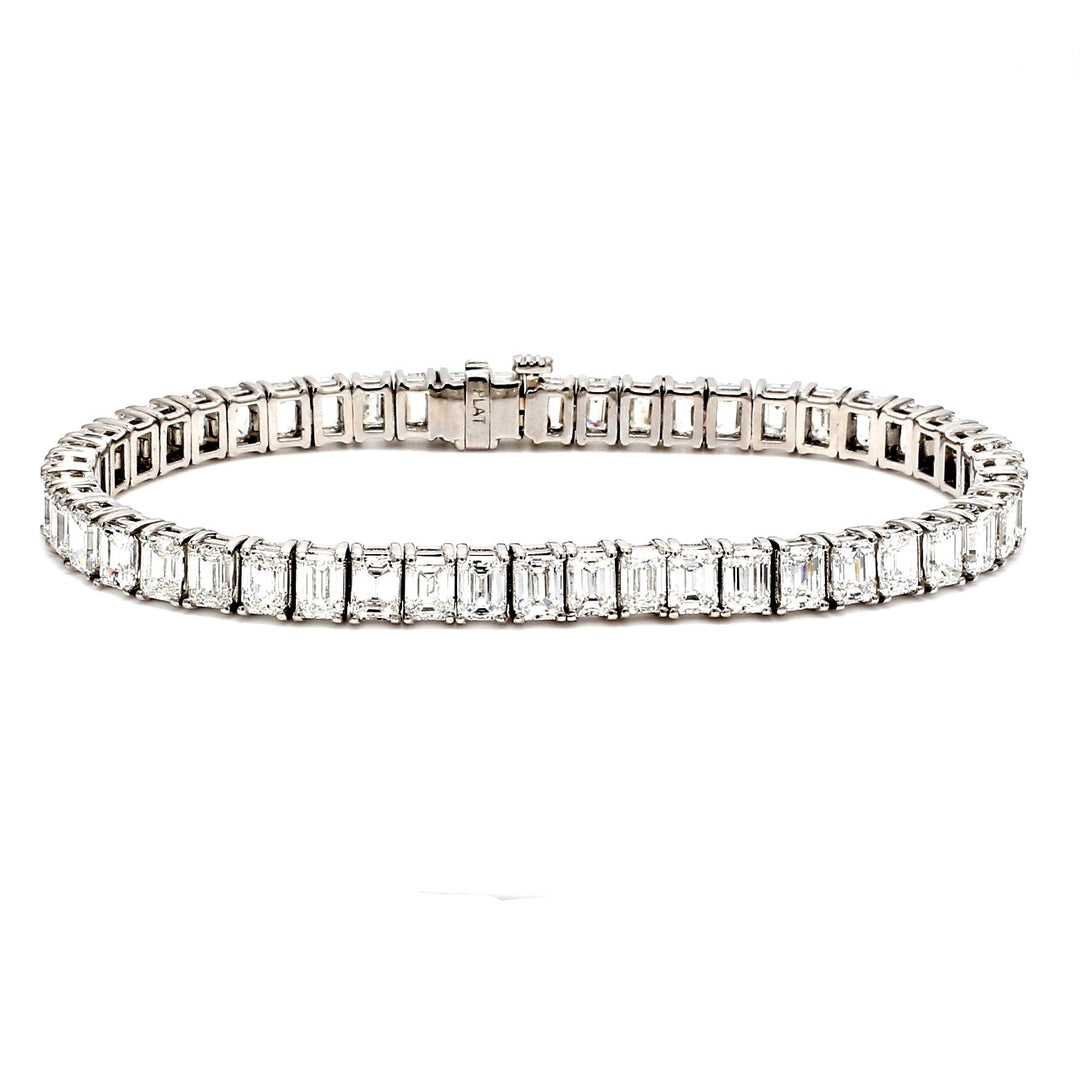 7"" Tennis bracelet in platinum with 4-prong set (49) emerald cut diamonds.  D15.30ct.t.w.