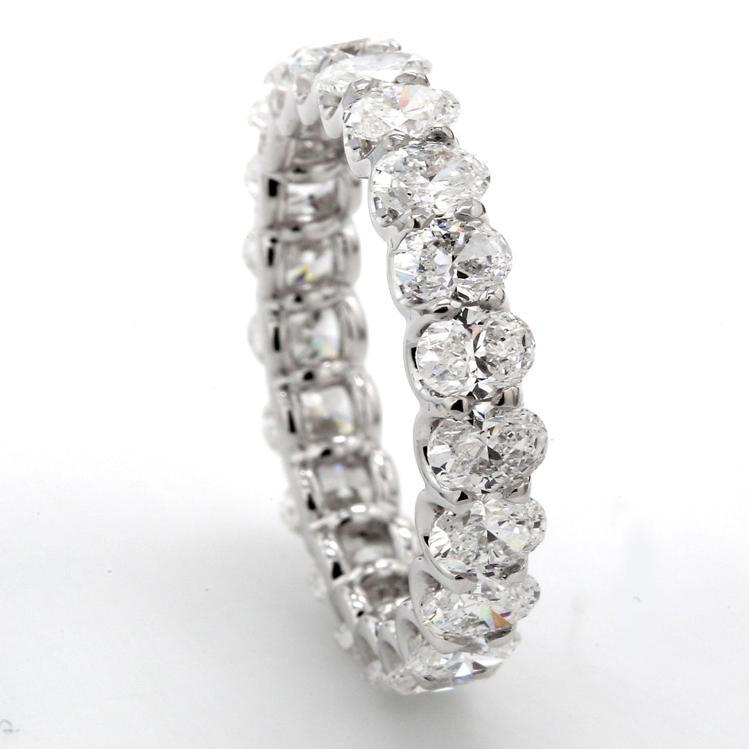Eternity band with shared U-prong set (21) oval diamonds.  D3.17ct.t.w.  Size 6