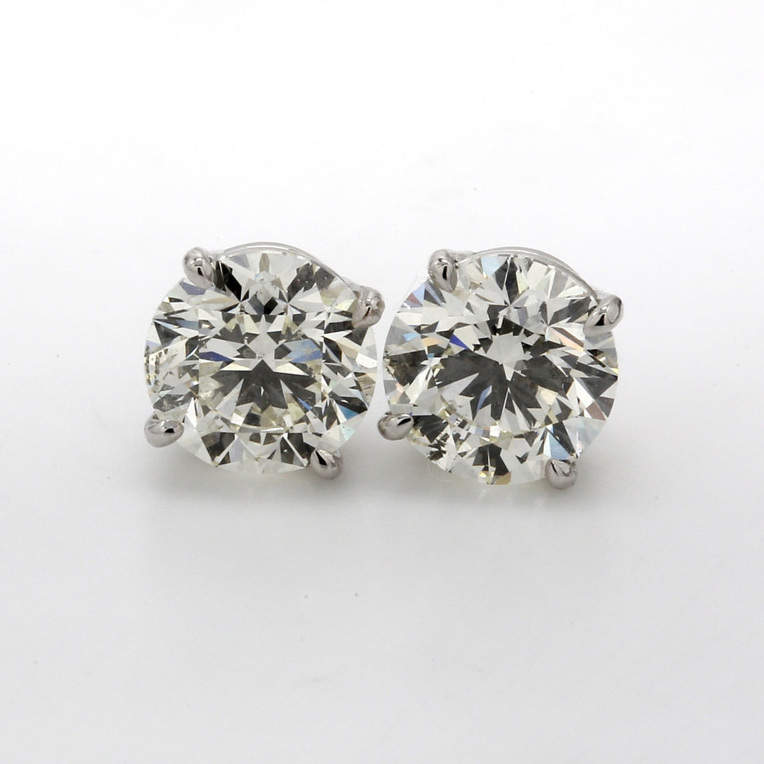 Screw back stud earrings with 4prong set USA certified  I-J/SI2  round diamonds.  D4.01ct.t.w.